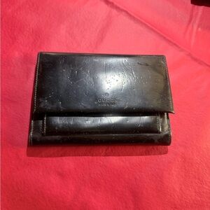 Gucci tri-fold wallet. Please see imprints in leather. Look at pics please